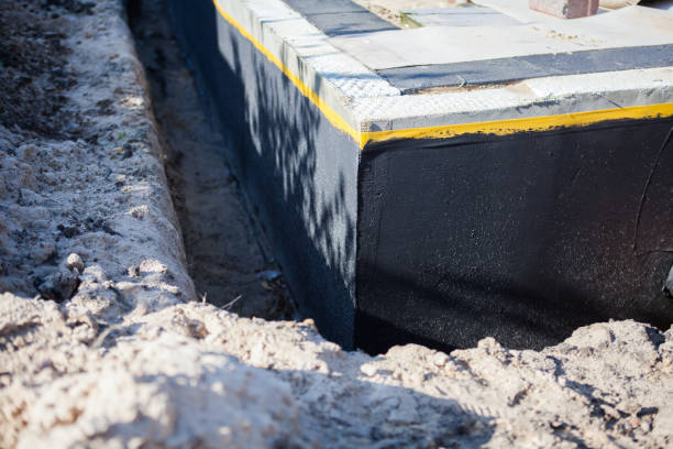 Professional Waterproofing technician working in Corunna, IN
